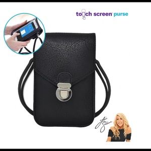 Touchscreen crossbody purse-new in package. Unopened. Color is Wine